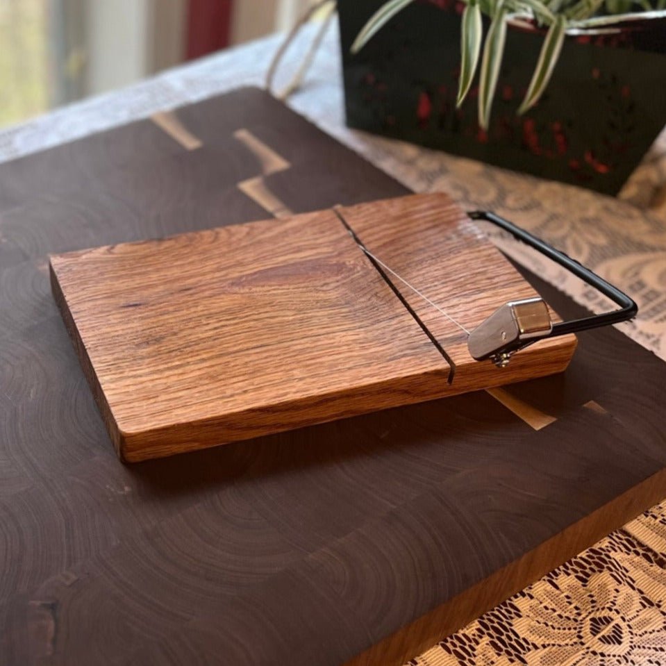 Cheese slicer. Available in cherry , walnut and maple.